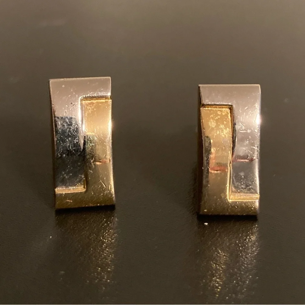 Golden and silver tone cuff links